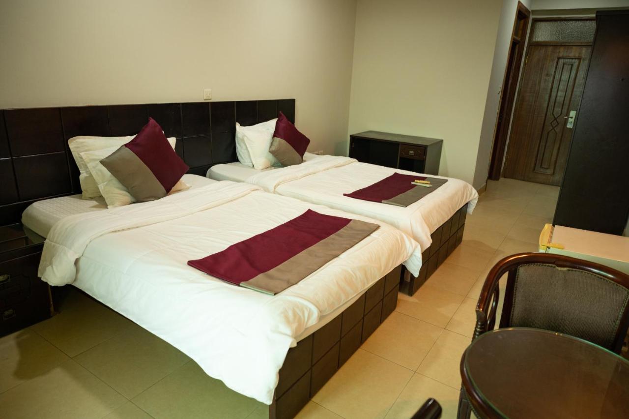 Korkdam Hotel Taifa Exteriör bild